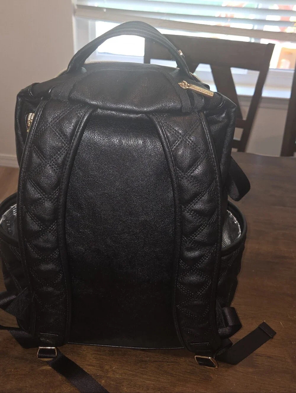 Itzy Ritzy Black Quilted Backpack Diaper Bag with Gold Hardware